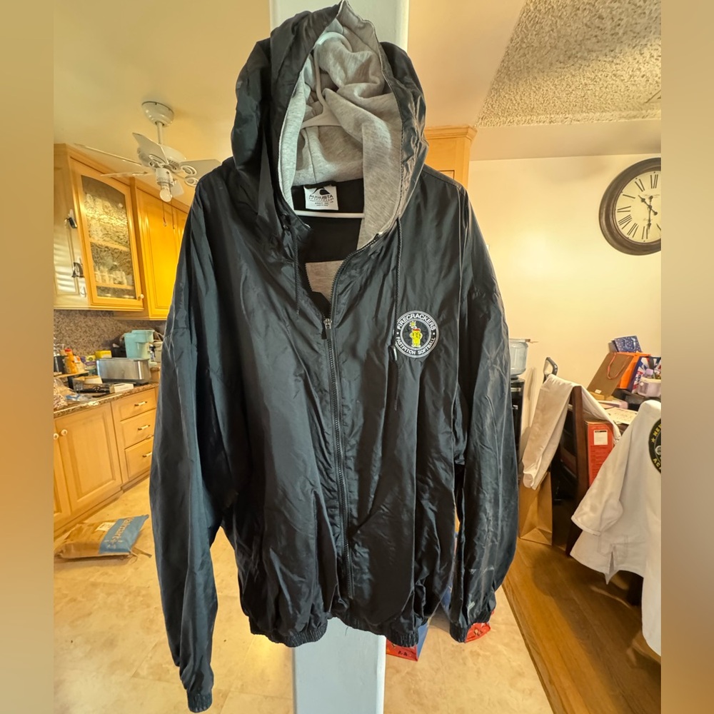 FIRECRACKERS Augusta Sportswear Black Hooded Windbreaker